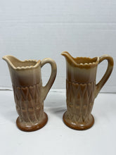 Cargar imagen en el visor de la galería, Antique Greentown Caramel Slag Glass Shuttle Pattern Creamer Pitcher Pair