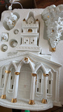Load image into Gallery viewer, Porcelain Illuminated “Christmas Church & Caroler” 8-Piece Lighted Holiday Village Set – White & Gold Accents