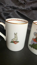 Load image into Gallery viewer, Fitz & Floyd “Deck the Halls” Vintage Christmas Mugs – Early 1980s Holiday Scene – Set of 2
