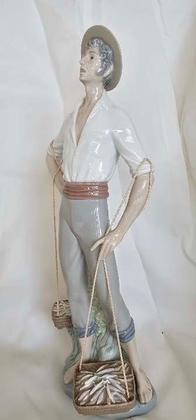 The Lladro Porcelain "Fisherman" Figurine