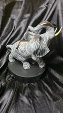Load image into Gallery viewer, Vintage-Style Textured Gray Elephant Figurine with Raised Trunk &amp; Gold Accents
