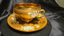 Load image into Gallery viewer, Vintage Bohemian Art Glass Teacup and Saucer Gold Gilt Enamel Floral Set
