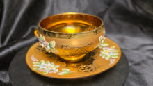 Load image into Gallery viewer, Vintage Bohemian Art Glass Teacup and Saucer Gold Gilt Enamel Floral Set
