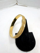 Load image into Gallery viewer, Vintage Monet Gold Tone Textured Diagonal Stripe Bangle Bracelet 7.5-8 Inch
