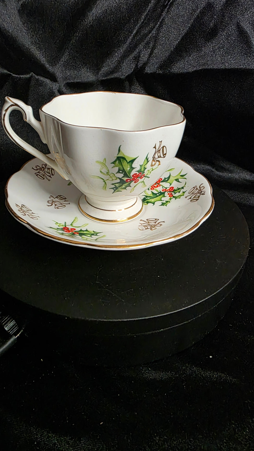 Queen Anne “Yuletide” Fine Bone China Teacup & Saucer – England, 1950s Holiday Holly & Bells Pattern