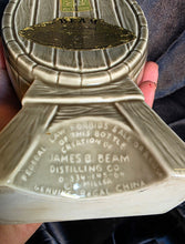 Load image into Gallery viewer, Vintage 1964 Jim Beam &quot;Musicians on a Cask&quot; Regal China Decanter – A Mid-Century Barware Masterpiece
