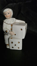 Load image into Gallery viewer, Vintage Monti Piero Porcelain Harlequin Clown Figurine with Dice – White &amp; Gold Elegance
