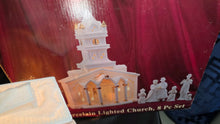 Load image into Gallery viewer, Porcelain Illuminated “Christmas Church &amp; Caroler” 8-Piece Lighted Holiday Village Set – White &amp; Gold Accents

