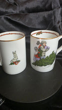 Load image into Gallery viewer, Fitz &amp; Floyd “Deck the Halls” Vintage Christmas Mugs – Early 1980s Holiday Scene – Set of 2

