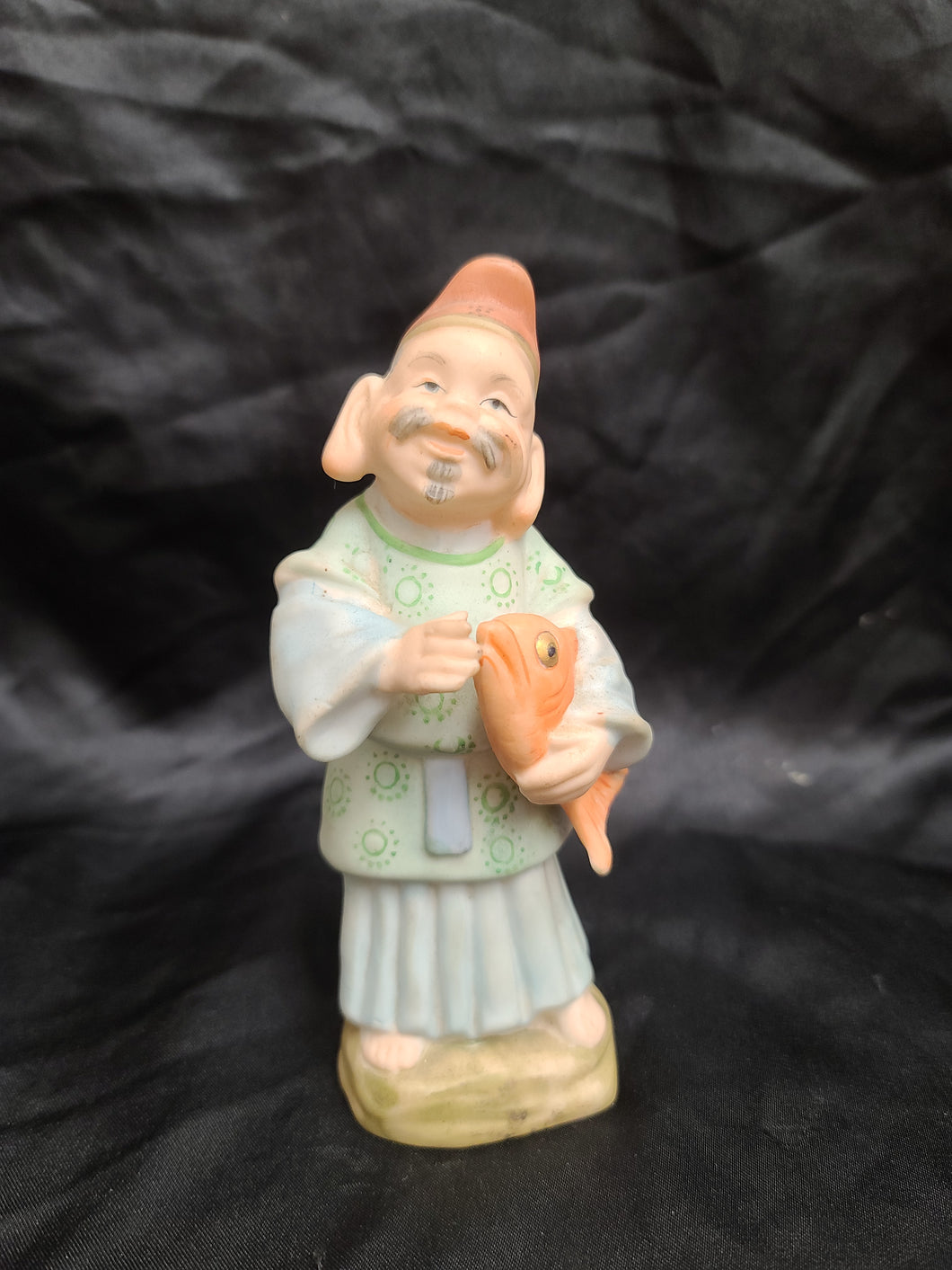 Vintage Asian Fisherman Figurine Good condition no chips or cracks Size 6.5